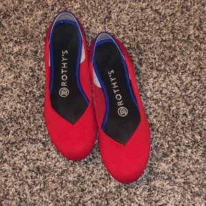 Rothy’s red flats. Only worn a few times.